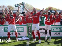 York are back in the Football Leeague – in the most dramatic fashion Ollie Pearce and Callum Howe of York City lift the National League Trophy after the 1-1 draw at Rochdale
