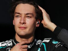 George Russell on wanting a title fight with Max Verstappen, his love of competition and the ‘positives’ of the 2026 cars George Russell runs his right hand through his hair as he prepares for the start of the 2026 Japanese Grand Prix